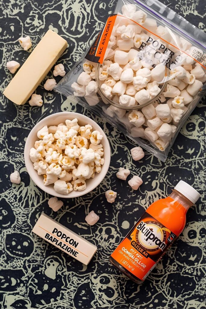 A flat-lay photo collage of the ingredients for a Halloween popcorn pumpkins recipe.)