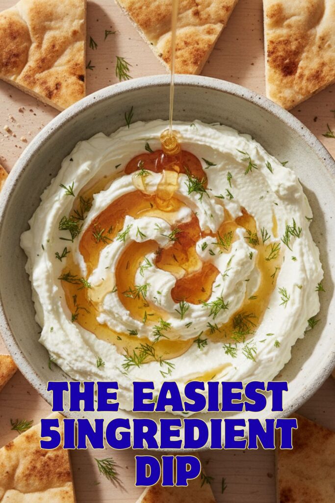 A delicious bowl of whipped feta dip with honey and herbs, with a text overlay that reads "The Easiest 5-Ingredient Dip."
