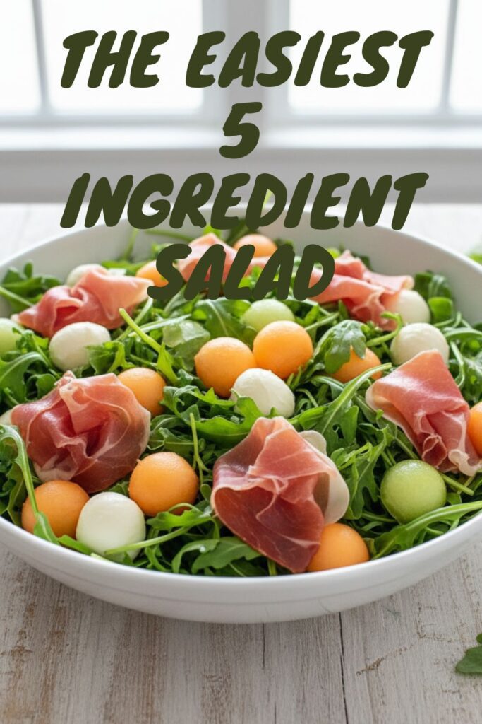 A beautiful 5-ingredient salad with arugula, melon, and prosciutto in a large bowl, with a text overlay.