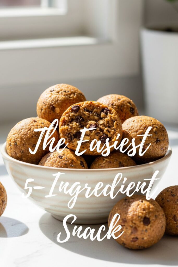 A bowl of delicious peanut butter energy balls with a text overlay that reads "The Easiest 5-Ingredient Snack."