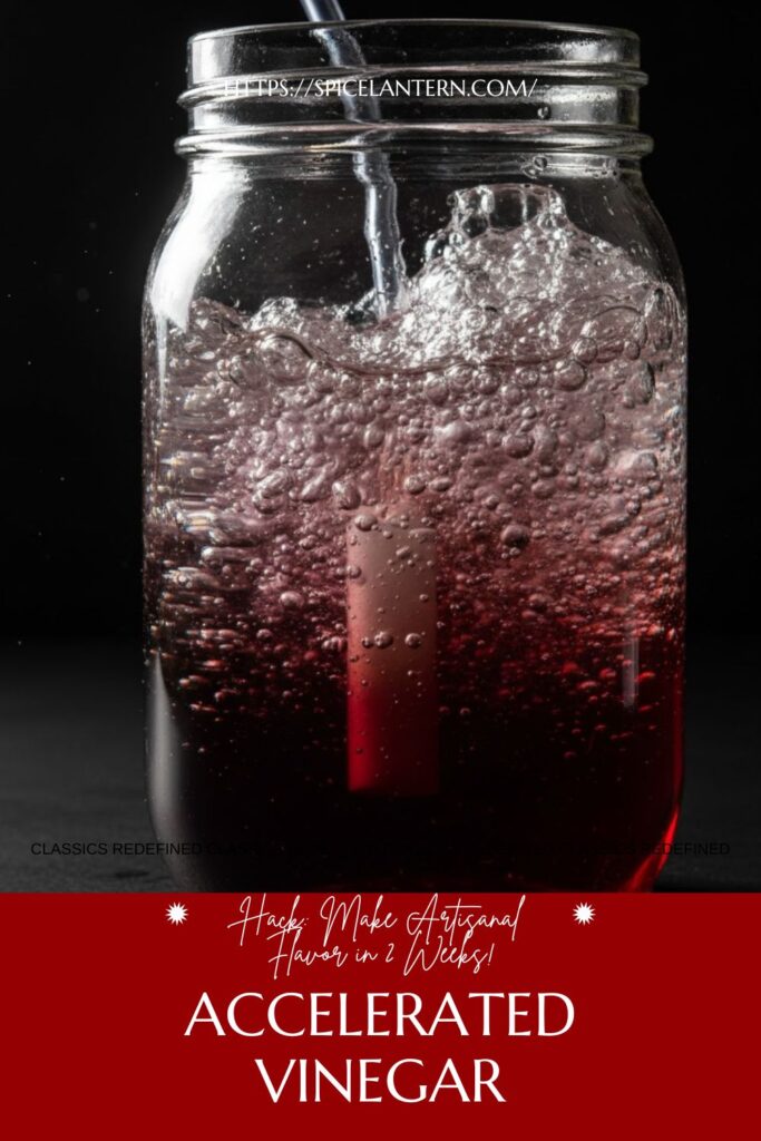 Mason jar of red wine vinegar actively fermenting with an air pump and stone, ready for text overlay "Accelerated Vinegar")
