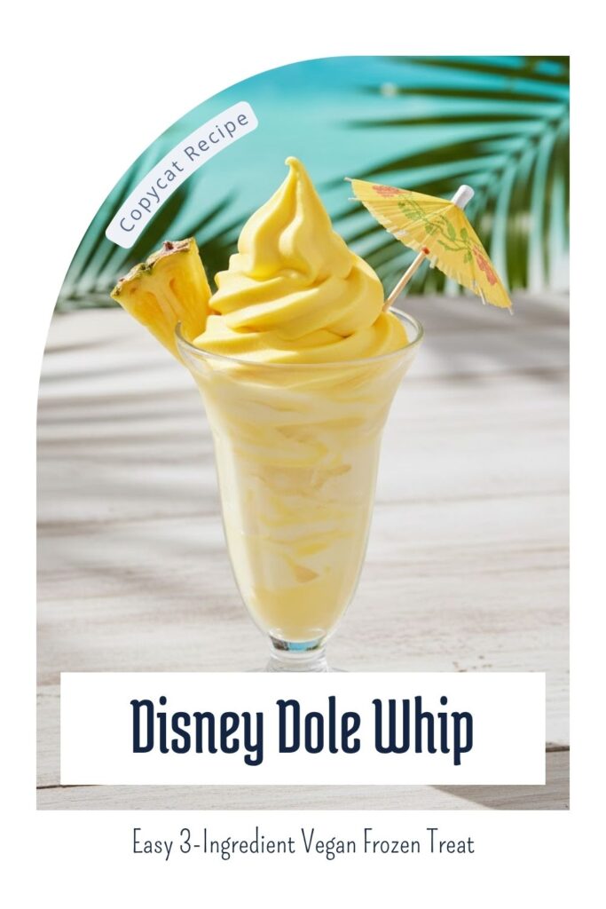 A bright yellow, perfectly swirled pineapple Dole Whip in a clear glass, with a slice of pineapple as garnish. The text "Disney Dole Whip" is overlaid.