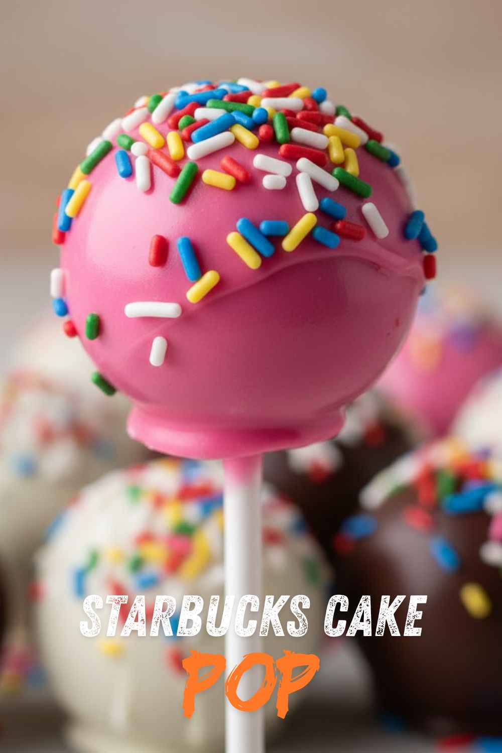 "Starbucks cake pop" text overlay on a whimsical image of several perfectly round, pink-frosted cake pops with colorful sprinkles on sticks, arranged artfully on a light-colored background.