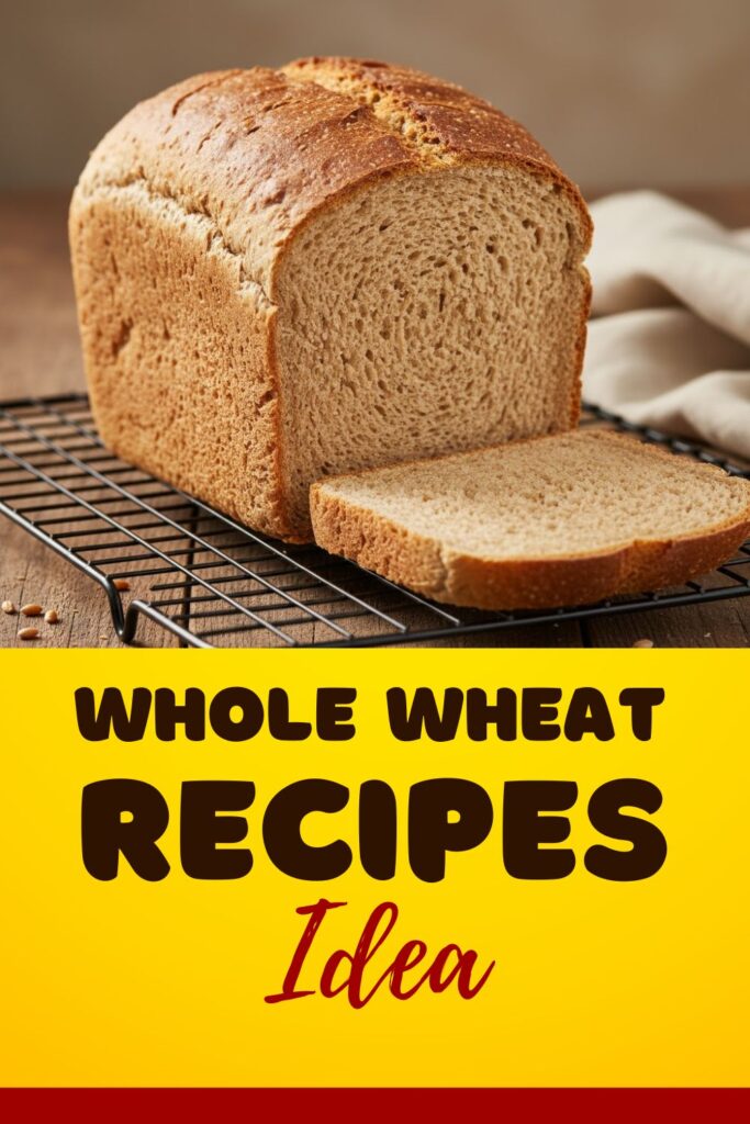 A tall, golden-brown loaf of soft whole wheat bread on a cooling rack, with a slice showing the fluffy interior, ready for text overlay "Whole Wheat")