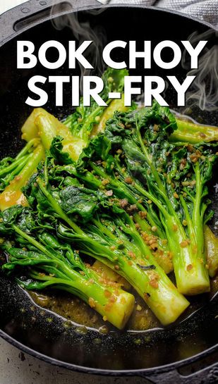 A vibrant, glossy bok choy stir-fry in a wok, showing the crisp white stalks and bright green wilted leaves coated in a savory brown sauce. Text overlay reads: BOK CHOY STIR-FRY