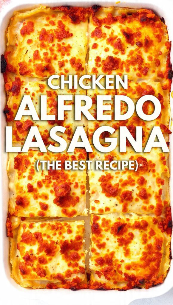 Close-up of baked chicken Alfredo lasagna with golden-brown, bubbly cheese and creamy white sauce.