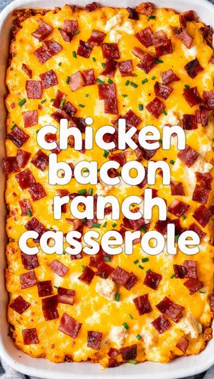 A highly aesthetic overhead close-up of a 9x13 dish of bubbling, golden chicken bacon ranch casserole with a melted cheese crust, garnished with fresh bacon crumbles and chives, featuring the main keyword text overlay.