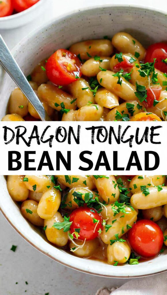 Overhead close-up of a bowl of bright green/yellow Dragon Tongue Bean Salad, showing the cut beans, halved cherry tomatoes, and glistening lemon-herb vinaigrette. The text overlay reads: "DRAGON TONGUE BEAN SALAD".