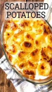 A bubbling casserole dish of golden brown scalloped potatoes with fresh thyme.