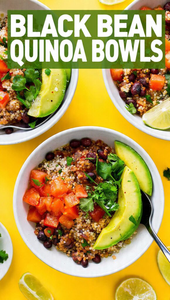 A colorful black bean quinoa bowl with avocado and lime and text overlay "Black Bean Quinoa Bowls".